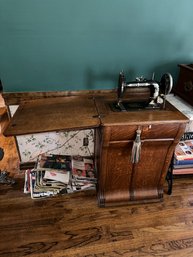 Antique English Walnut Sewing Machine And Cabinet