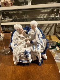 Porcelain Figurine Blue & White British Couple On A Settee