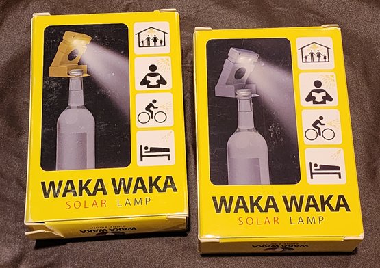 (2) Brand New WAKA WAKA Solar Lamps