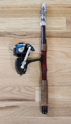 Vintage Telescoping Fishing Rod With A BERKLEY 4200 Reel