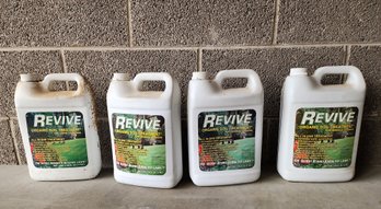 (4) Pre Owned Bottles Of REVIVE Lawn Care Enhancer