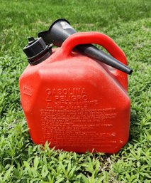 Red Gas Can With Existing Gasoline Inside