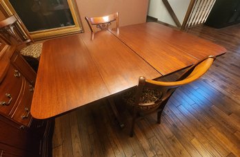 Beautiful Wooden Dining Table With Metal Cap Feet And (3) Extension Sections