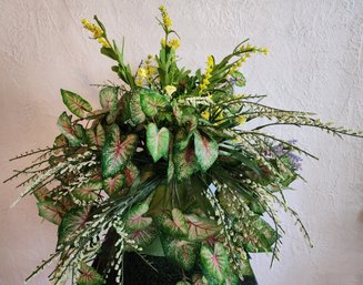 Ceramic Pitcher With Metal Handle And Artificial Floral Arrangement