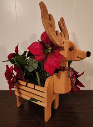 Vintage Wooden Reindeer Display With Artificial Poinsetta Floral Arrangement