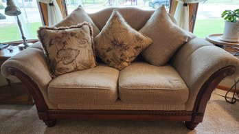 Upholstered Loveseat With Wooden Frame And Throw Pillows