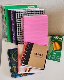 Assortment Of Blank Notebooks And Journals With Unused Pencils