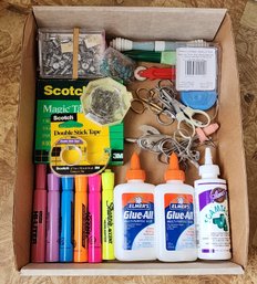 Box Filled With Office Supplies