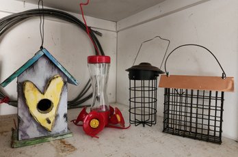 Assortment Of Bird Feeder Selection And Bird House