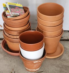 Assortment Of Small Clay Flower Pots And Seeds