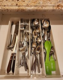 Assortment Of Flatware And Plastic Organizers