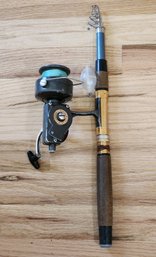 Vintage Telescoping Fishing Rod With A RODDYMATIC 825-RL Reel