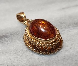 Stunning 14k Yellow Gold Pendant With Amber Center Accent