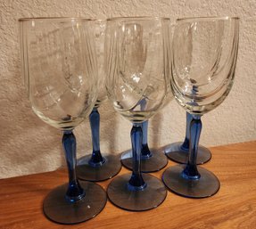 Set Of Blue And Clear Wine Glasses