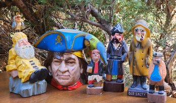 Vintage Assortment Of Ceramic And Wooden Pirate And Adventurer Themed Examples