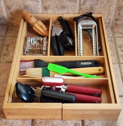 Wooden Drawer Organizer Tray Filled With Assortment Of Kitchen Essentials