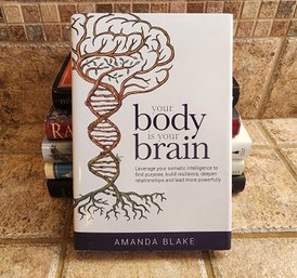 Assortment Of Books Feat. YOUR BODY IS YOUR BRAIN