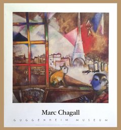 27w X 29h Framed Mark Chagall Print, Guggenheim Museum. Modern Blonde Wood Frame.