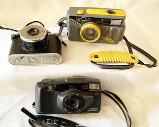 Antique Vintage SLR Film Camera Lot: Kodak Duex, Minolta Freedom Zoom 90C, LeClic Waterproof Camera