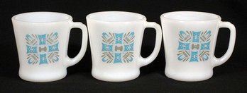 THREE GLASS D-HANDLE MUGS IN THE 'BLUE HEAVEN' PATTERN PRODUCED FOR ROYAL CHINA, 1960s