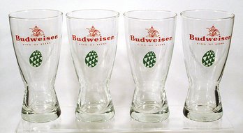 SET OF FOUR VINTAGE BUDWEISER BEER ADVERTISING GLASSES WITH EASTER EGG DECORATION, CIRCA 1960s