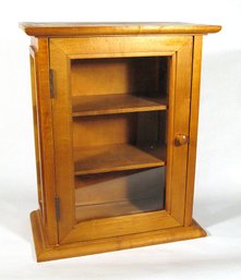 SMALL MAPLE AND GLASS CABINET