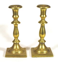 ANTIQUE PAIR OF CAST BRASS BALUSTER CANDLESTICKS, 19TH CENTURY