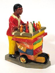 VINTAGE FOLK ART SCULPTURE OF A SHAVED ICE VENDOR, HAITI, MID-TO-LATE 20TH CENTURY