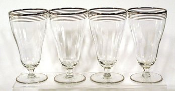 SET OF 4 VINTAGE FOOTED AND PLATINUM-BANDED ICED TEA GLASSES, CIRCA 1930s - 1950s