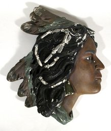 ANTIQUE CHALKWARE WALL PLAQUE OF A NATIVE AMERICAN HEAD, EARLY 20TH CENTURY