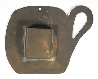 VINTAGE HANDMADE SHEET BRASS FOLK ART HANGING MATCH HOLDER IN THE FORM OF A CUP OR MUG, EARLY 20TH CENTURY