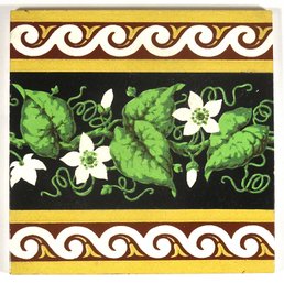 THREE IDENTICAL ANTIQUE TILES BY MINTON DEPICTING FLORAL AND VINE MOTIFS, CIRCA 1870s