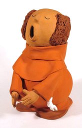 POTTERY SCULPTURE OF A STORYTELLER MONK BY JUAN SANDOVAL, NEW MEXICO, 2006