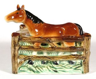 VINTAGE FIGURAL PLANTER IN THE FORM OF A HORSE IN CORRAL, CIRCA 1950s