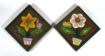 TWO VINTAGE CARVED AND PAINTED WOODEN FOLK ART WALL PLAQUES WITH FLORAL MOTIFS, CIRCA 1960s