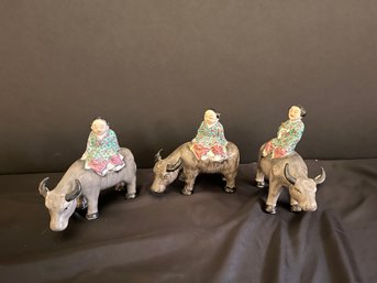 Set Of Three Chinese Herd Boys Riding Buffalo Porcelain Pieces