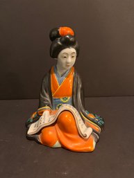 Seated Porcelain Geisha Figurine Reading Scroll