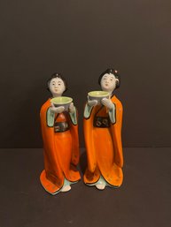 Pair Of Porcelain Geisha Figurines Holding Bowls