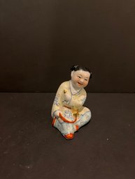 Vintage Chinese Fencai Porcelain Figure Playful Sitting Child