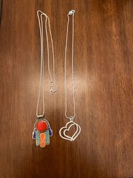 Pair Of Necklaces With Sterling Silver Chains