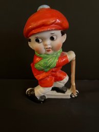 Porcelain Figurine- Boy On Scooter