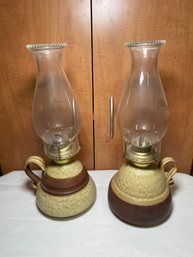 Two Pottery Oil Lamps