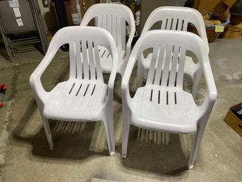Four Plastic Chairs