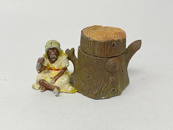 Man Seated Near Stump Inkwell