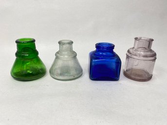 Four Ink Bottles