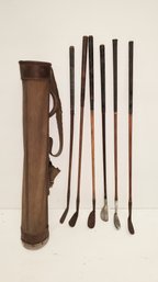 Six Wooden Shafted Antique Golf Clubs With Cloth Bag