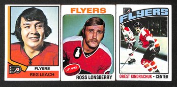 1974, 1975-'76 Topps:  Reg Leach, Ross Lonsberry & Orest Kindrachuk {3-Card Lot}