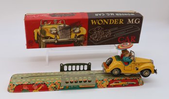 Wonder M.C. Car Tin Litho Wind-up Toy