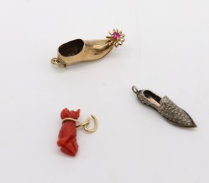 Three Charming Pendants, 1 GOLD AND 1 SILVER