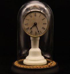 Whimsical Candlestick Clock Under Dome